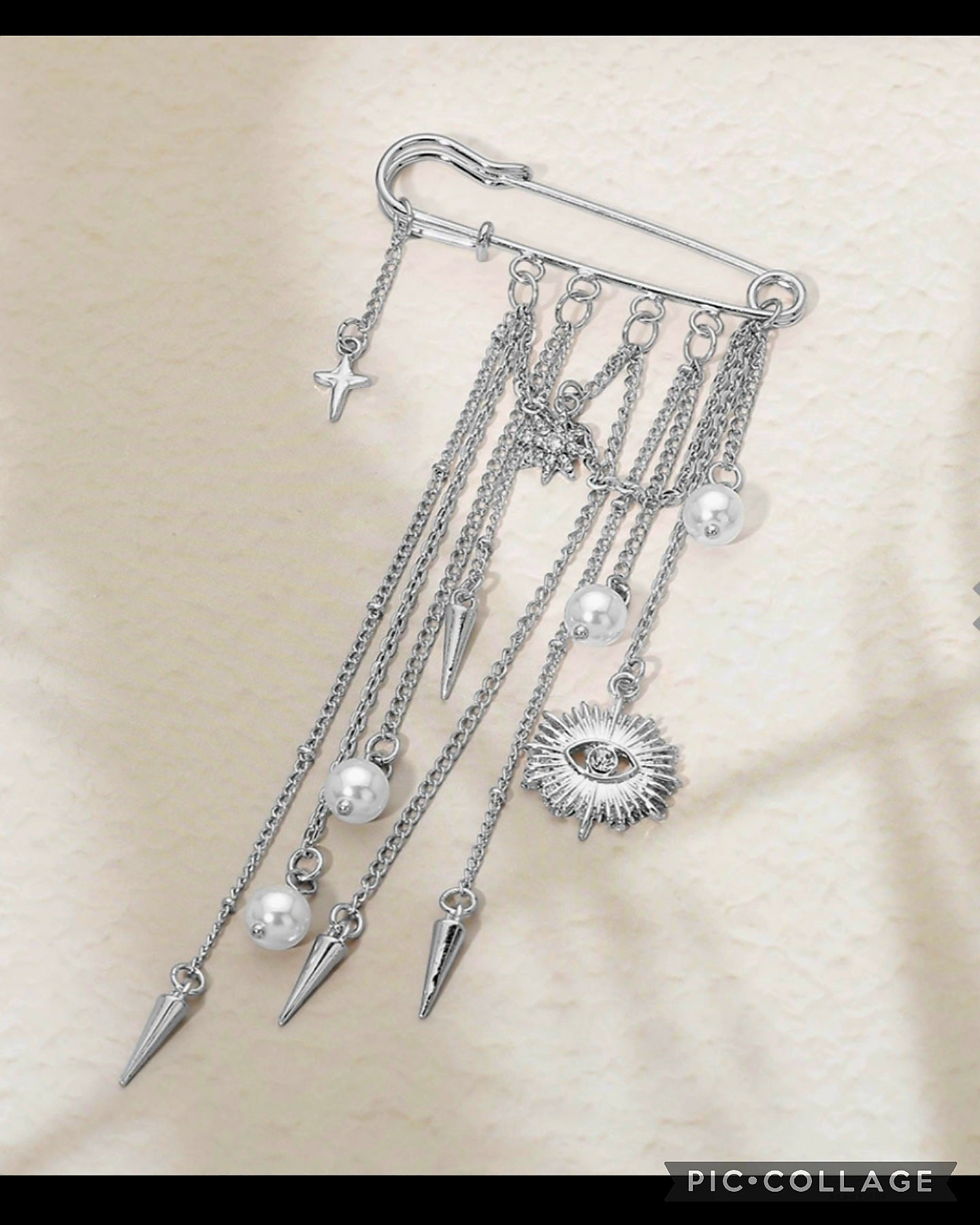 Silver Charm Brooch