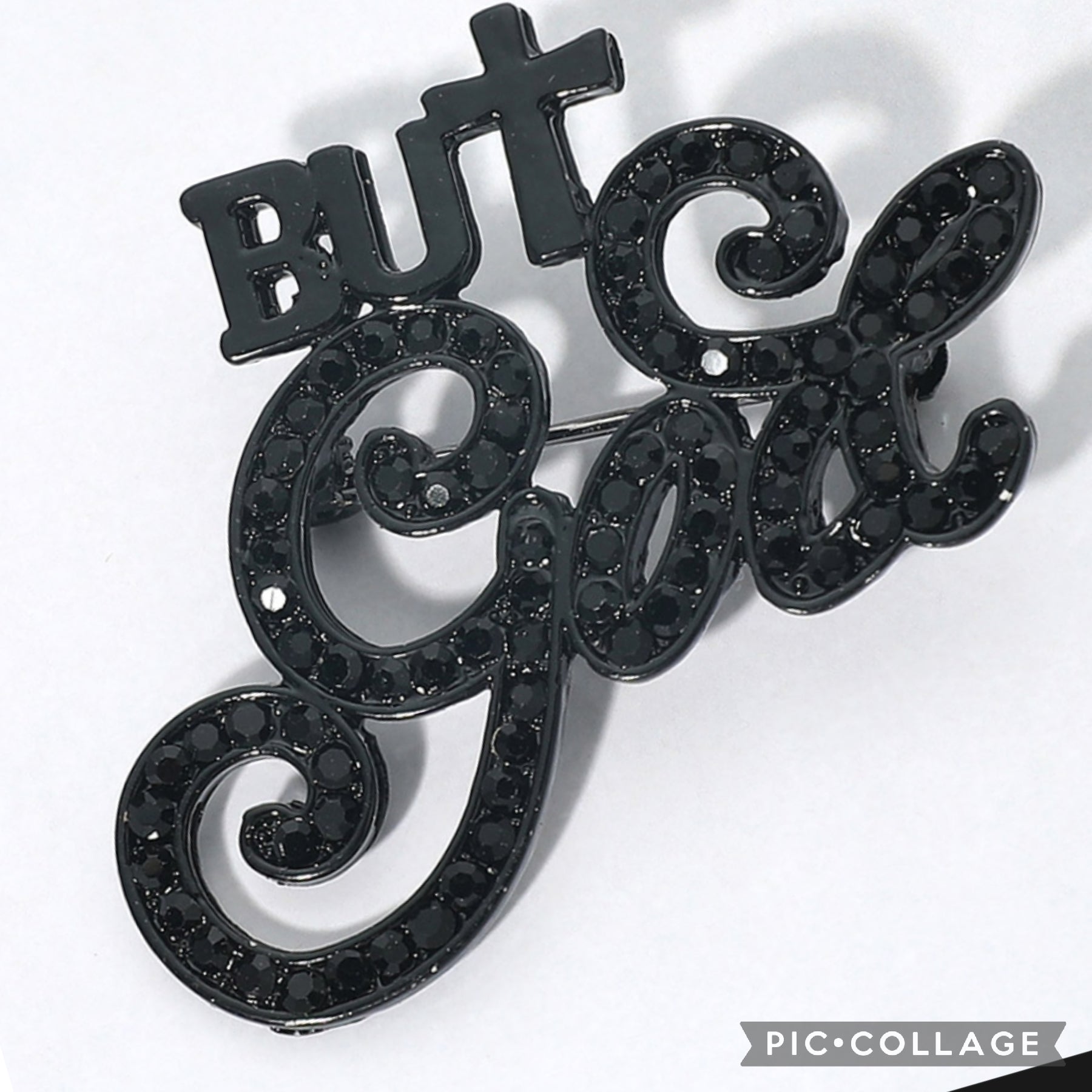 Black Lacquer Rhinestone But "God" Brooch